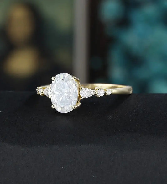Oval Moissanite Engagement Ring with Pear Accents