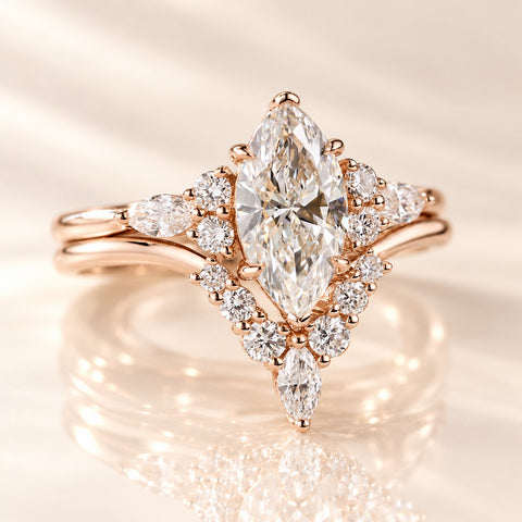 Side profile of the rose gold marquise engagement ring showing its open gallery and full band
