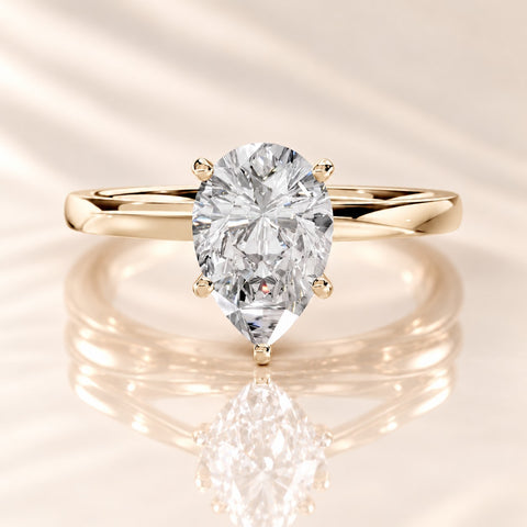 Front view of the UL-0004 pear lab-grown diamond solitaire ring in 14K yellow gold